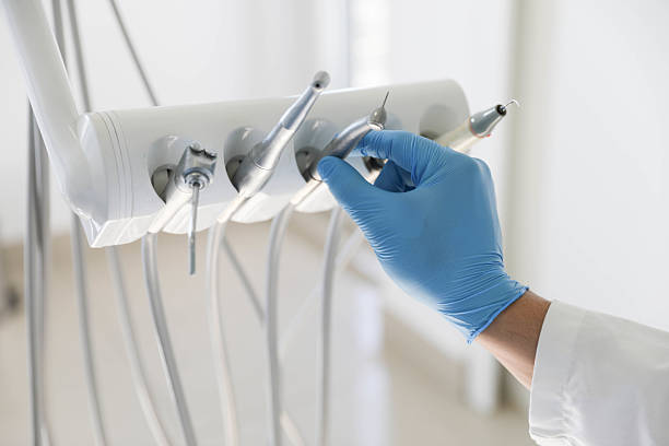 Professional Tooth Extraction technician working in Johnson County County, IN